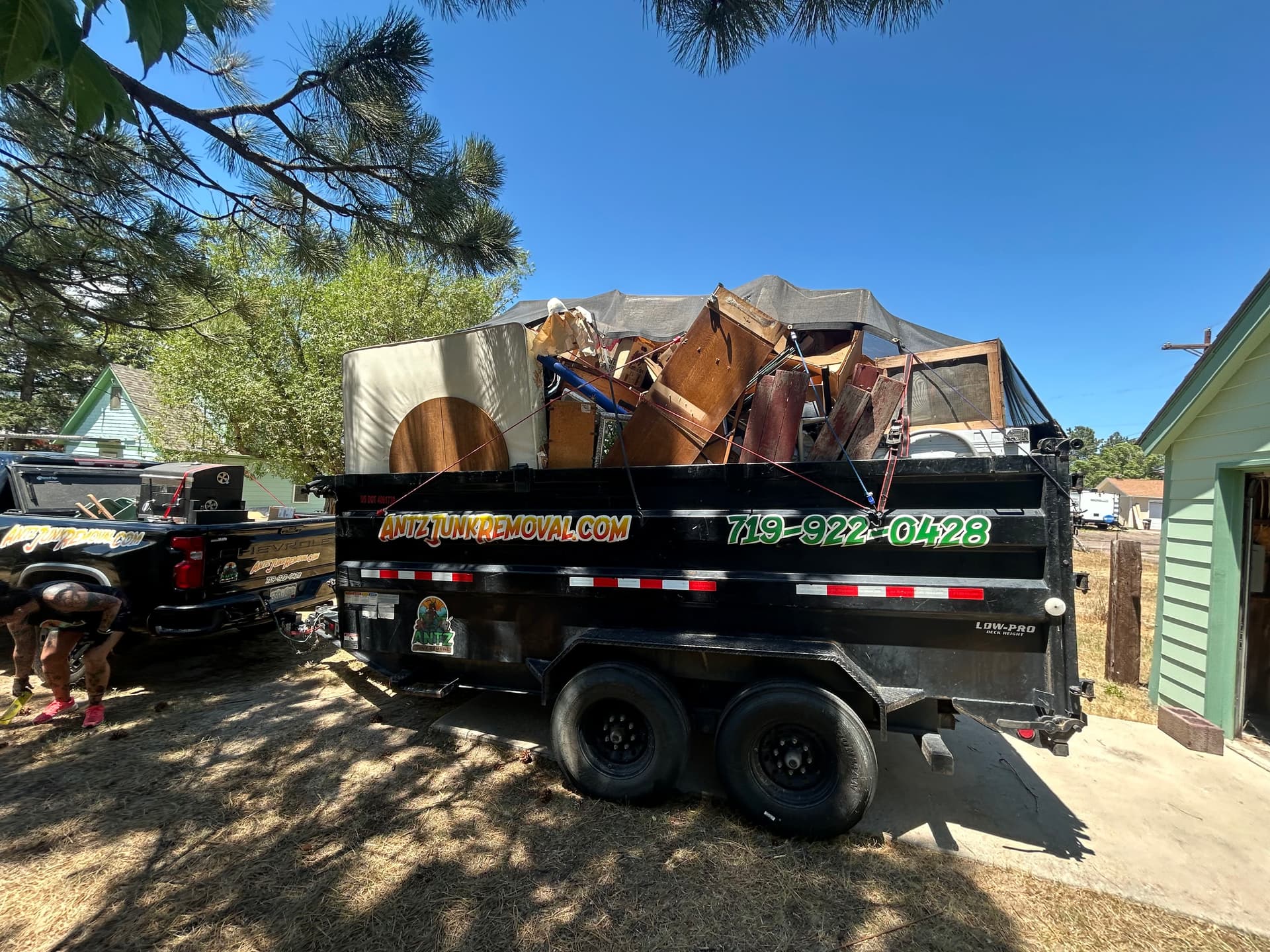 When the Junk Piles Up We Come Load It Up image